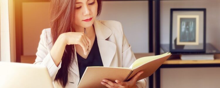 young-asian-business-woman-working-workplace-min